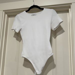 Aritzia Babaton contour short sleeve bodysuit size S
